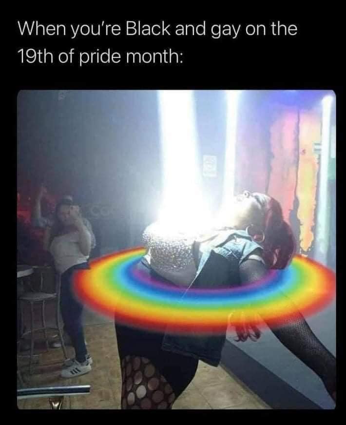 This meme is an image of a person, likely a performer or entertainer, dressed in a provocative outfit and striking a dramatic pose. The text above the image reads "When you're Black and gay on the 19th of Pride month" and the image itself is a photo of a person surrounded by a bright, rainbow-colored light. The implication is that the person is feeling a sense of joy and liberation on a day that is typically associated with Pride, but also acknowledges the complexities of being a Black and gay person in a community that is predominantly white and straight.